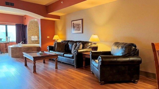 living room with hardwood / wood-style flooring