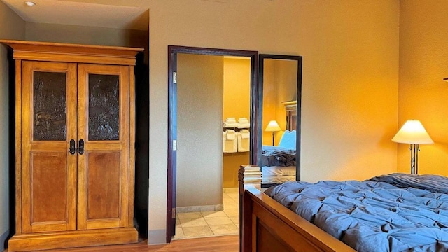 bedroom featuring light hardwood / wood-style floors