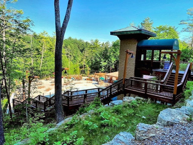 wooden deck featuring a patio area