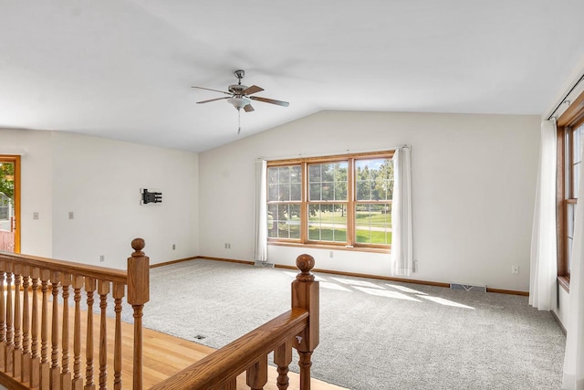 bedroom with carpet, ceiling fan, and vaulted ceiling