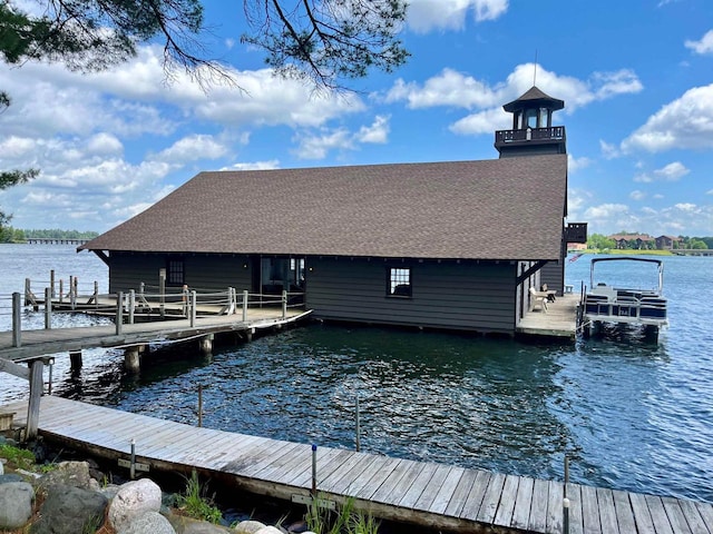 view of dock with a water view