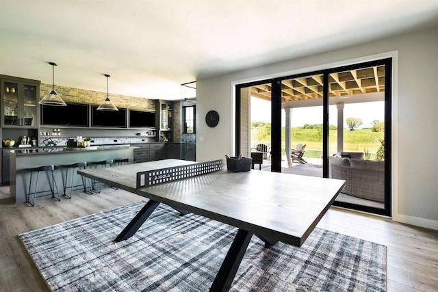 dining room with hardwood / wood-style flooring