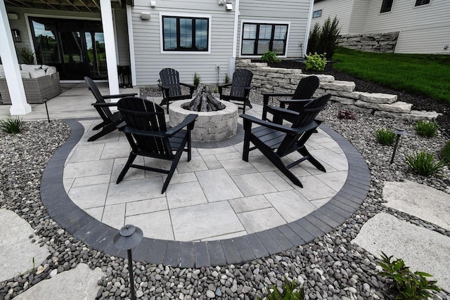 view of patio / terrace with a fire pit