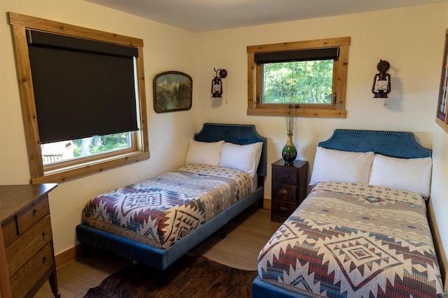 bedroom featuring hardwood / wood-style flooring