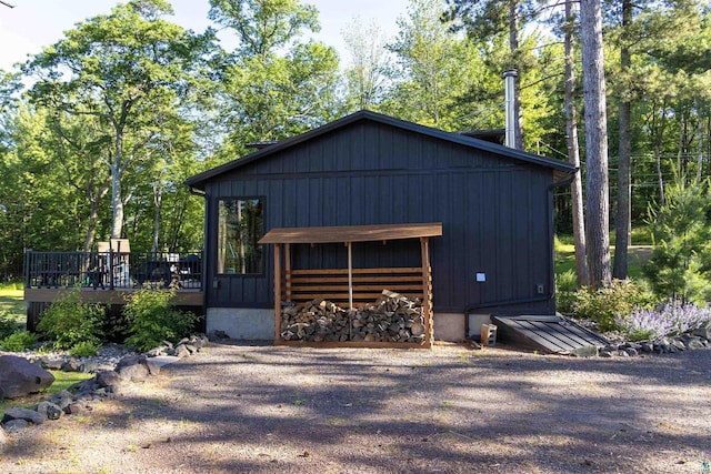 view of side of home featuring a deck