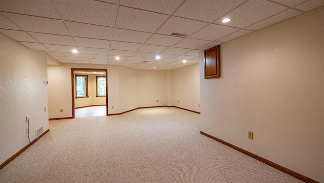 unfurnished room with light carpet