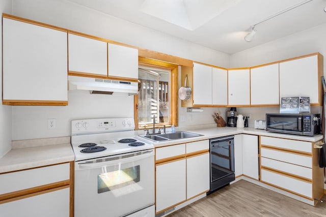 kitchen featuring sink, dishwasher, light hardwood / wood-style flooring, white electric stove, and white cabinets