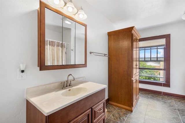 bathroom featuring vanity and walk in shower