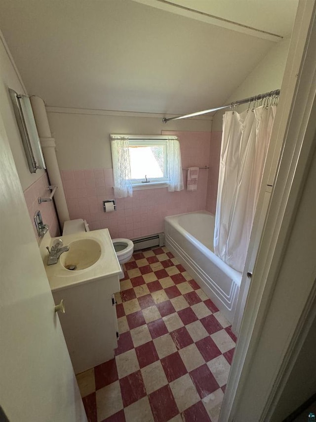 full bathroom featuring baseboard heating, toilet, shower / tub combo with curtain, vanity, and tile walls