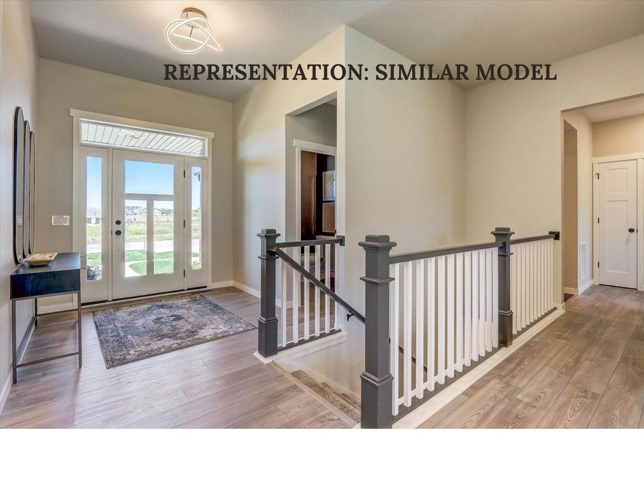 foyer entrance featuring hardwood / wood-style flooring