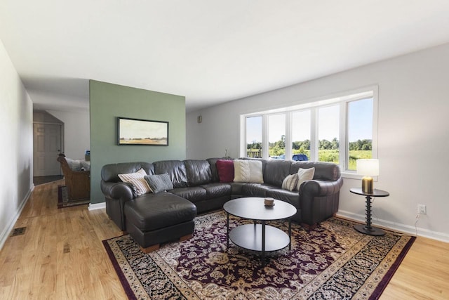 living room with light hardwood / wood-style floors