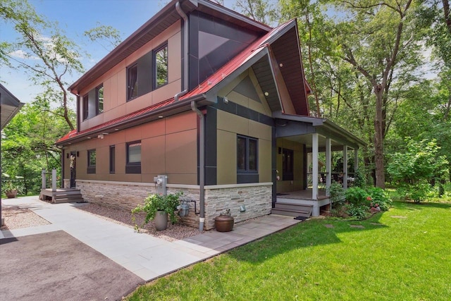 view of home's exterior featuring a yard