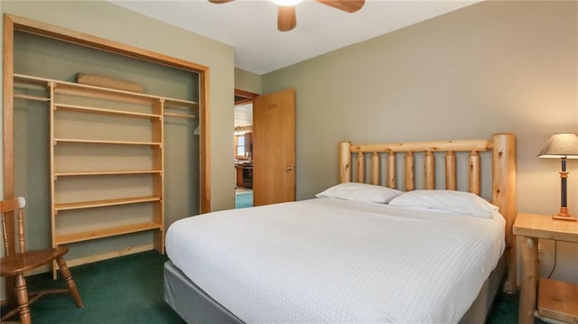 carpeted bedroom featuring ceiling fan and a closet