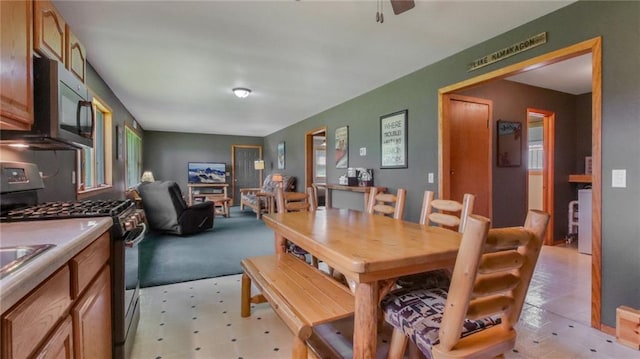 view of carpeted dining space