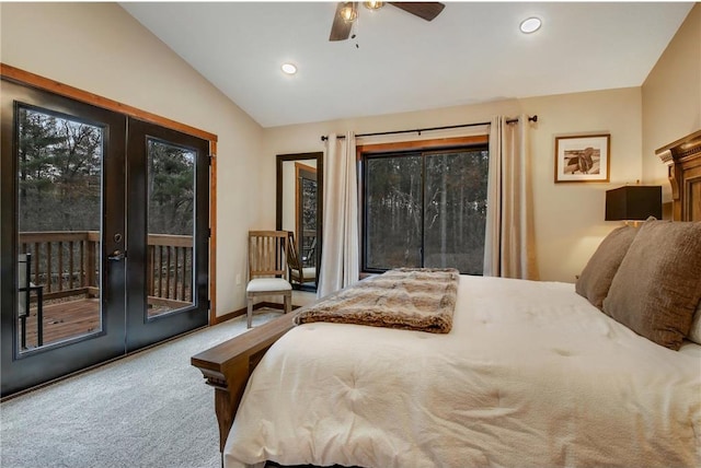 carpeted bedroom featuring access to exterior, french doors, vaulted ceiling, and ceiling fan