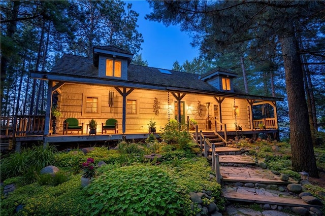 back of house with a porch