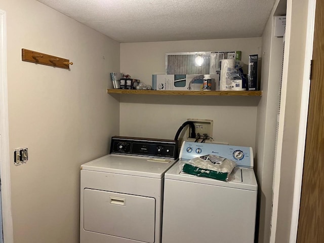 2217 Blackhawk St, Friendship, WI 53934 - laundry room with separate washer and dryer and a textured ceiling