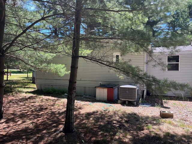 2217 Blackhawk St, Friendship, WI 53934 - view of home's exterior featuring central AC unit