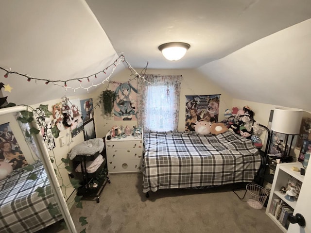 bedroom featuring carpet and vaulted ceiling