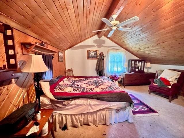 bedroom with ceiling fan, lofted ceiling with beams, wood walls, and wooden ceiling