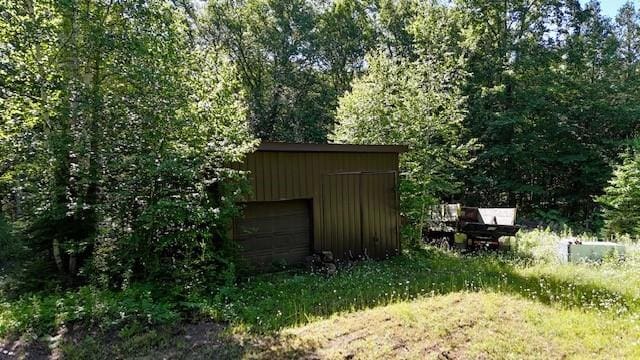 view of outdoor structure with a garage