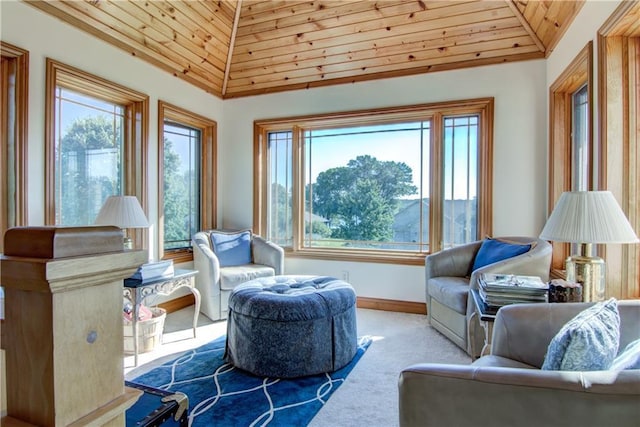 living area featuring light colored carpet, wood ceiling, and vaulted ceiling