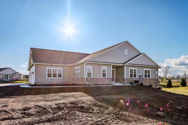 view of front of property featuring cooling unit