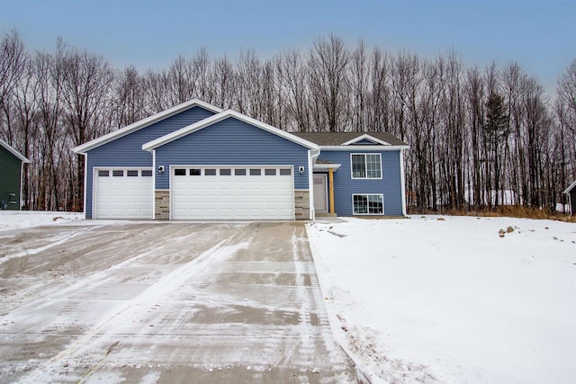 view of front of home with a garage