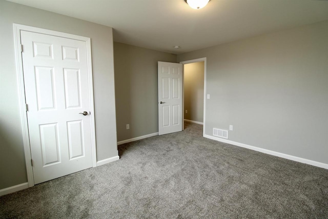 unfurnished bedroom with carpet