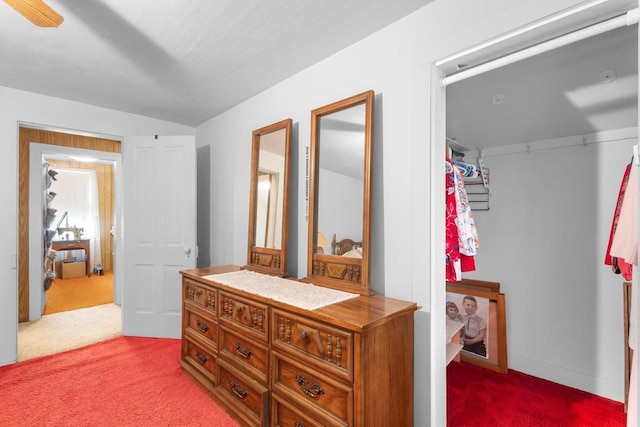 hallway with carpet floors