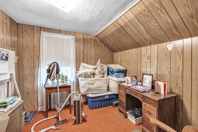 bedroom featuring carpet, wood ceiling, wooden walls, and vaulted ceiling