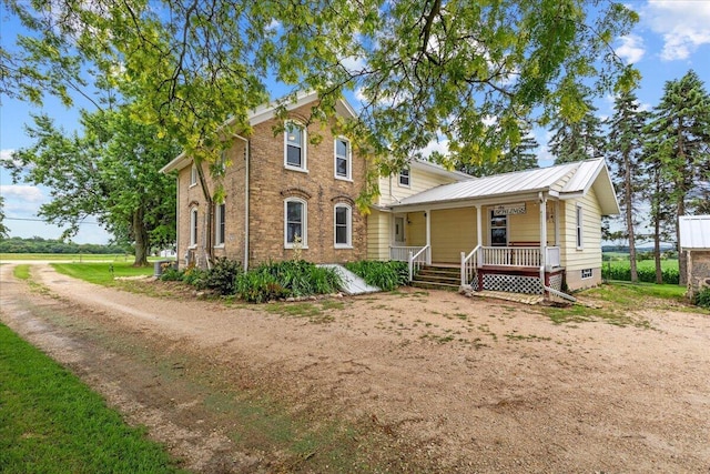 italianate home with covered porch