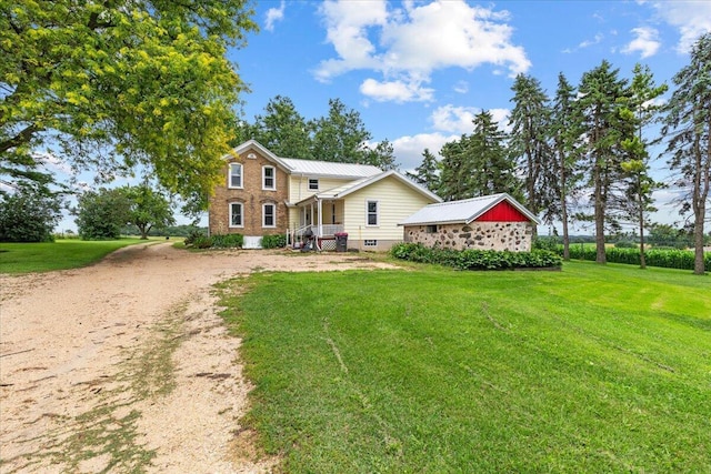 view of front of house with a front lawn