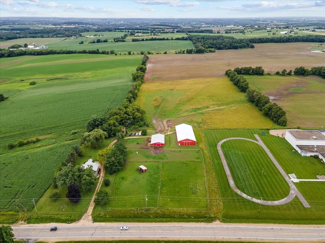 birds eye view of property featuring a rural view