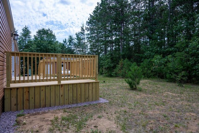 N9351 Juneau Ln, Necedah, WI 54646 - view of yard with a deck