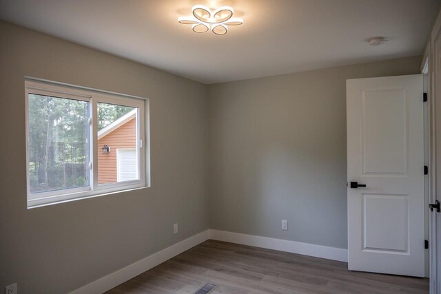 N9351 Juneau Ln, Necedah, WI 54646 - spare room with light hardwood / wood-style flooring