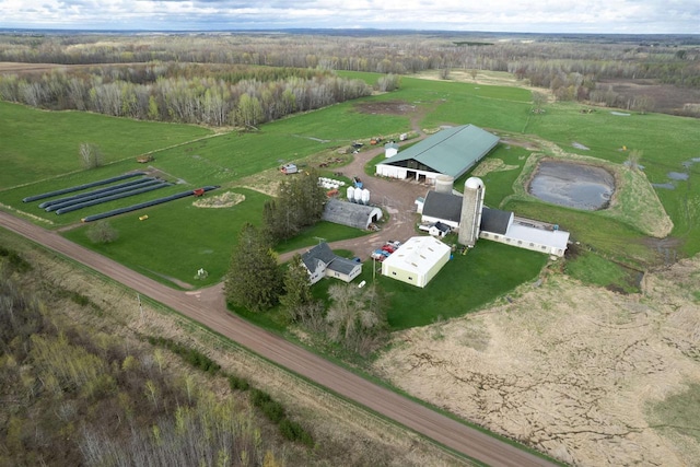 birds eye view of property featuring a rural view