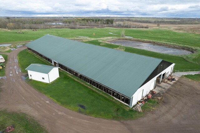 birds eye view of property featuring a rural view