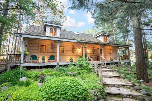 back of house with covered porch