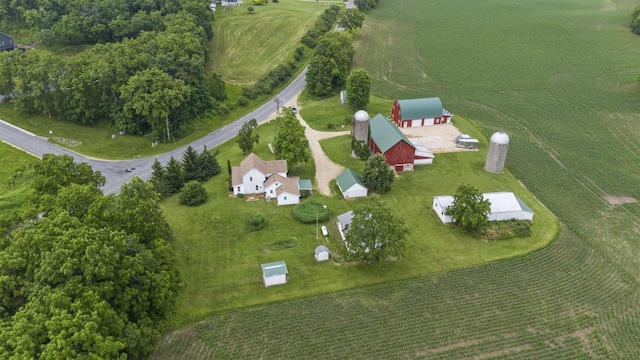 birds eye view of property with a rural view