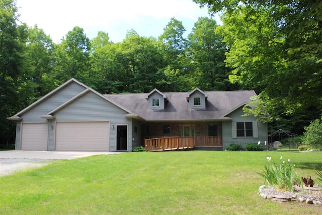 cape cod house featuring a garage and a front yard