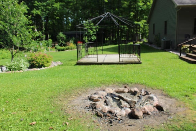 view of yard featuring a gazebo and cooling unit