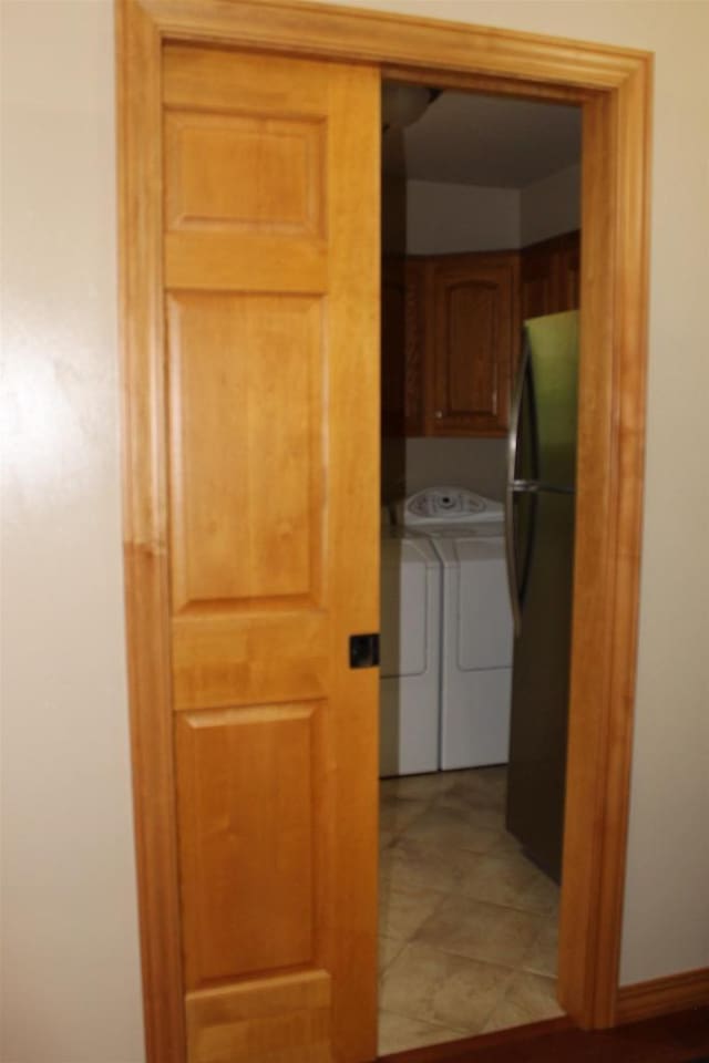 hall featuring washer and dryer