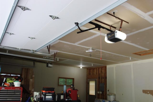 garage featuring a garage door opener