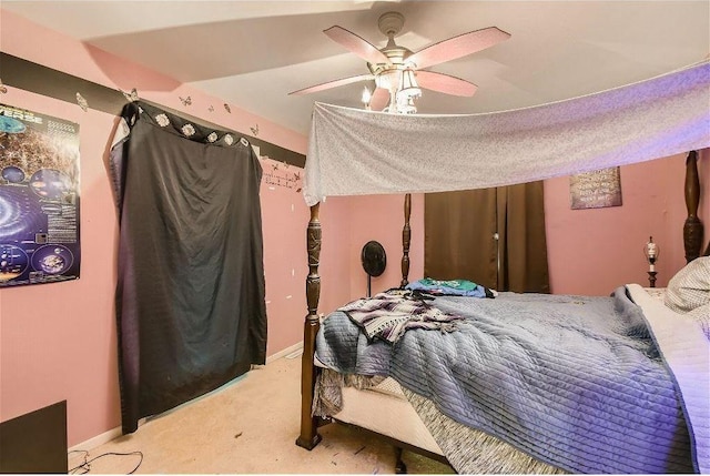 bedroom with ceiling fan and light colored carpet