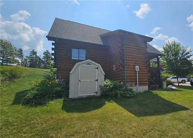 view of outdoor structure with a lawn