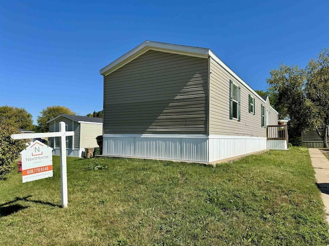 view of property exterior featuring a yard