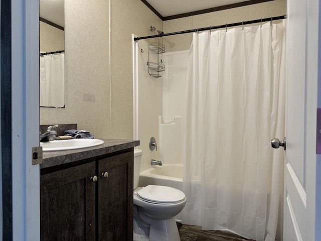 full bathroom featuring shower / tub combo, vanity, toilet, and ornamental molding