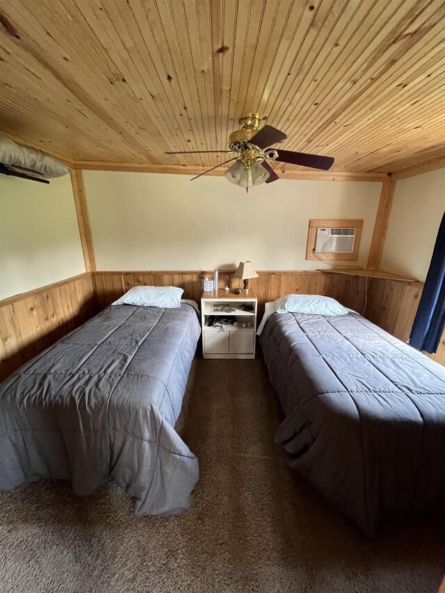 bedroom featuring wood walls, wood ceiling, and a wall mounted air conditioner