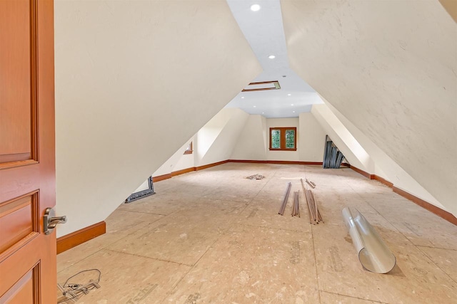 bonus room with vaulted ceiling